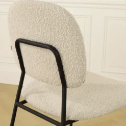Eetkamerstoel Jasmijn bouclé beige - zwart onderstel