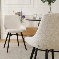 Eetkamerstoel Nena-Isa bouclé beige - zwart onderstel