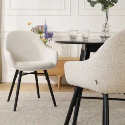 Eetkamerstoel Nena-Mae bouclé beige - zwart onderstel