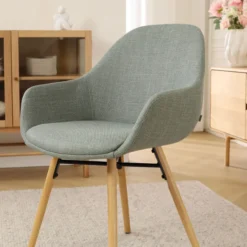 Eetkamerstoel Nena-Mae licht groen - houten onderstel