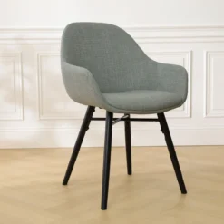 Eetkamerstoel Nena-Mae licht groen - zwart houten poten