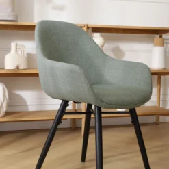 Eetkamerstoel Nena-Mae licht groen - zwart houten poten