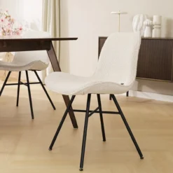 Eetkamerstoel Noa-Fé bouclé beige - zwart onderstel
