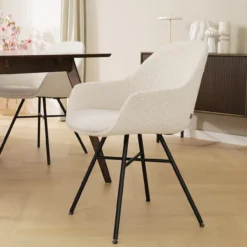 Eetkamerstoel Noa-Mae bouclé beige - zwart onderstel