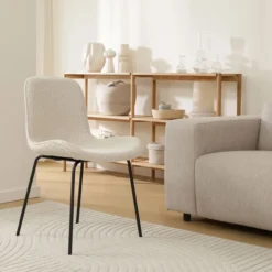 Eetkamerstoel Nora-Fé bouclé beige - zwart onderstel