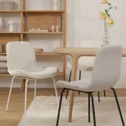 Eetkamerstoel Nora-Fé bouclé beige - zwart onderstel