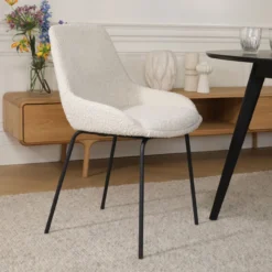 Eetkamerstoel Nora-Isa bouclé beige - zwart onderstel