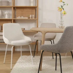 Eetkamerstoel Nora-Isa bouclé beige - zwart onderstel