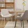 Eetkamerstoel Nora-Isa bouclé beige - wit onderstel