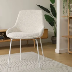 Eetkamerstoel Nora-Isa bouclé beige - wit onderstel