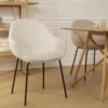 Eetkamerstoel Nora-Mae bouclé beige - zwart onderstel