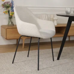 Eetkamerstoel Nora-Mae bouclé beige - zwart onderstel
