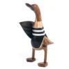 Houten eend surfboard staand