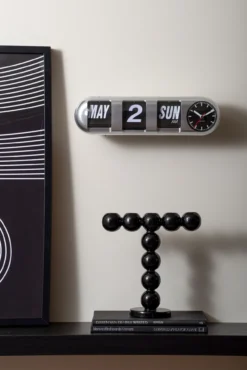 Wandklok Tube Flip - Heldergeel